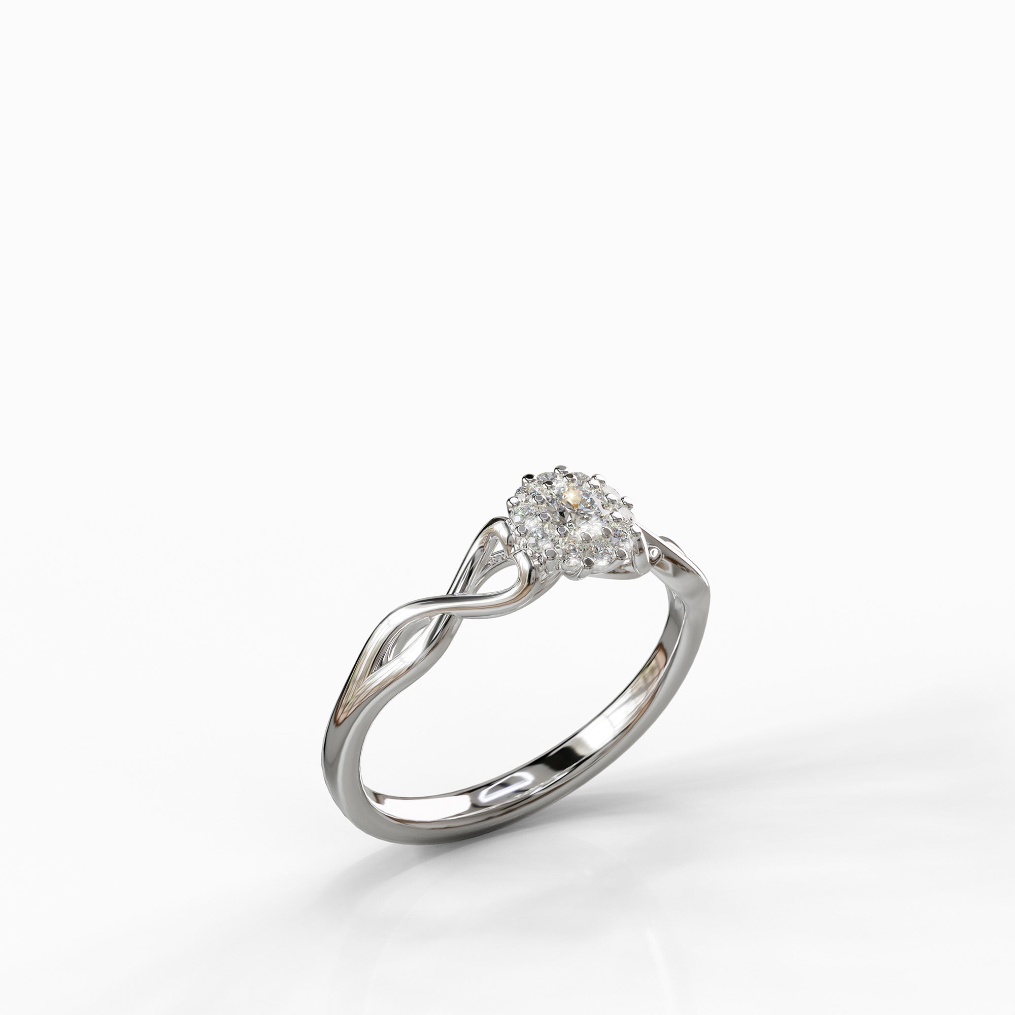 טבעת נאיה בזהב לבן עם שיבוץ יהלומים וקווים זורמים