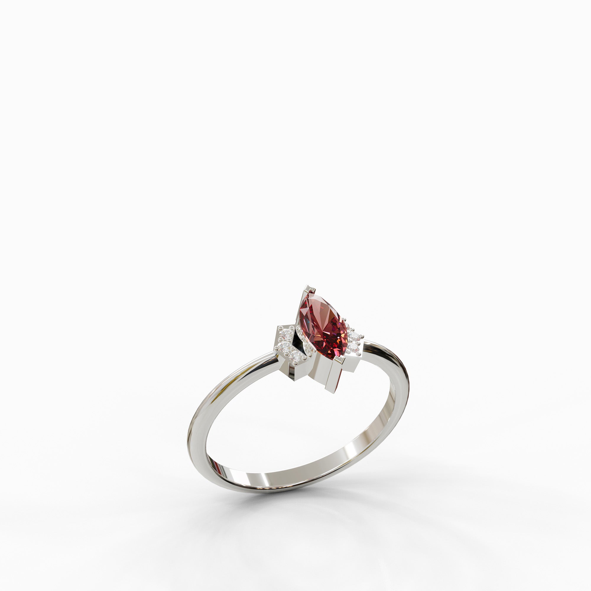 טבעת זהב לבן דגם Noa עם אבן רובי אדומה ויהלומים – תכשיט יוקרתי בעבודת יד